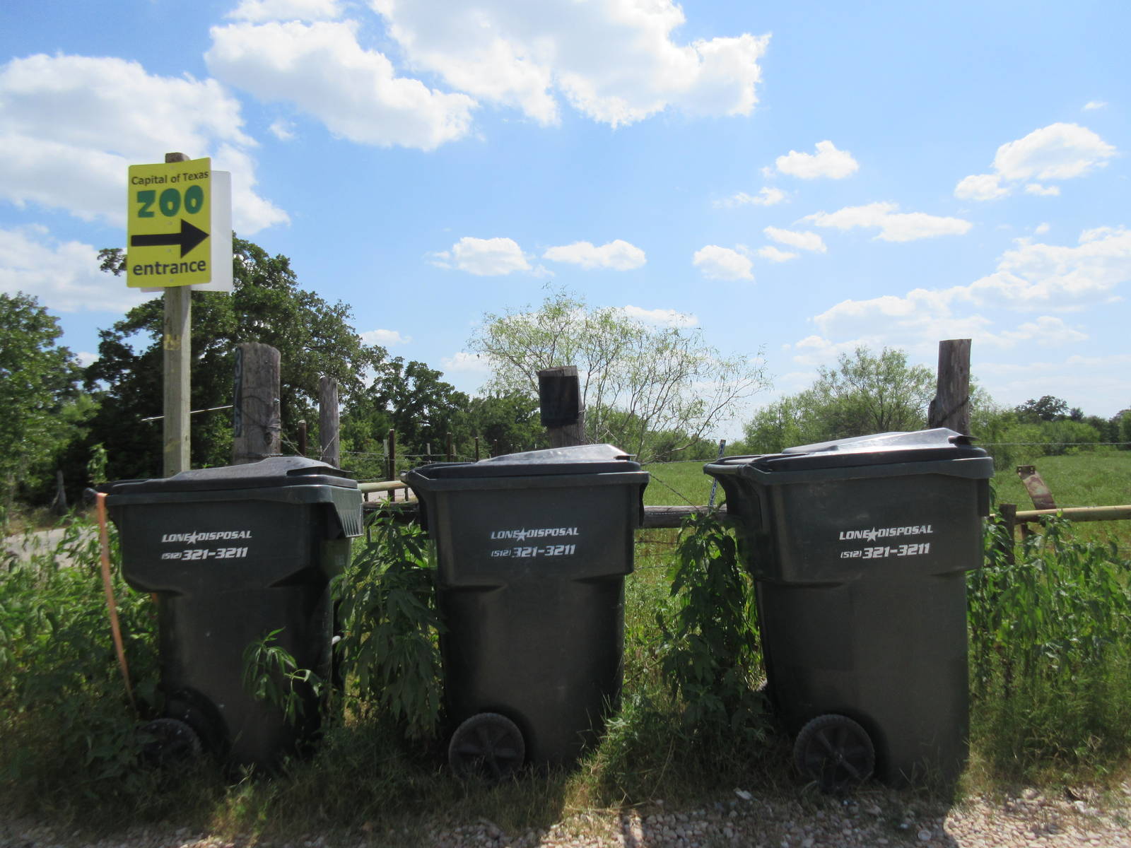 Entrance Sign (before a long gravel road that leads to the zoo)