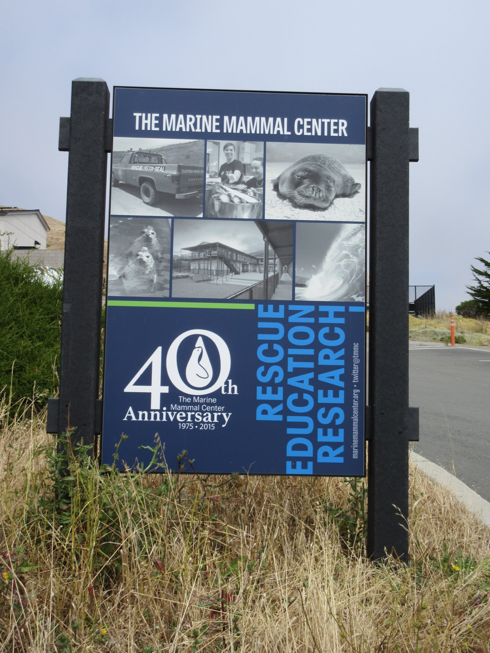 Entrance Sign (one of many signs alongside a steep road)