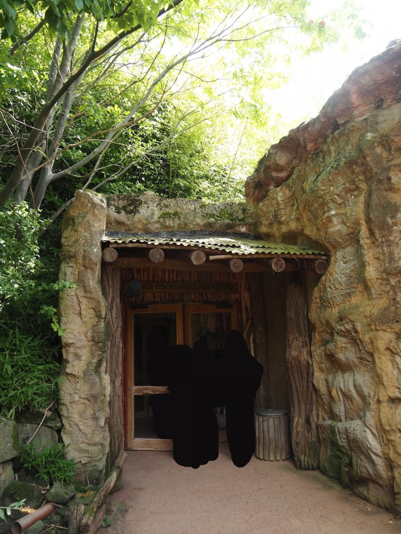 Entrance to Dschungel Abenteuer, African house with hippopotamus and chimpanzee indoor housing and smaller exhibits, 2024-08-05
