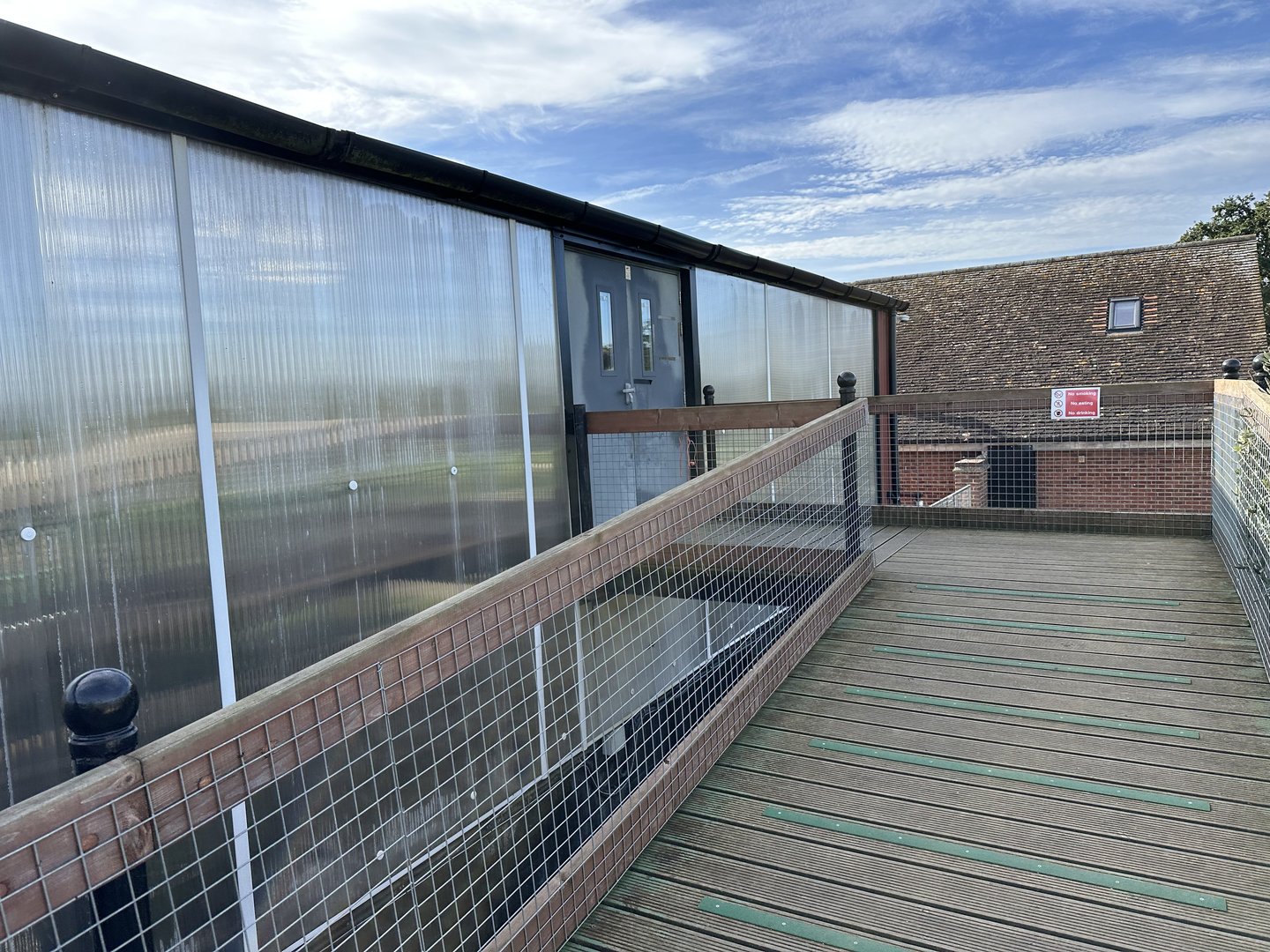 Entrance to the Tropical House at Johnsons of Old Hurst (October 2023)