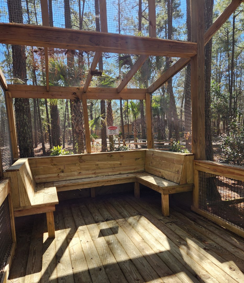 Eudora Wildlife Safari Park - Benches inside aviary
