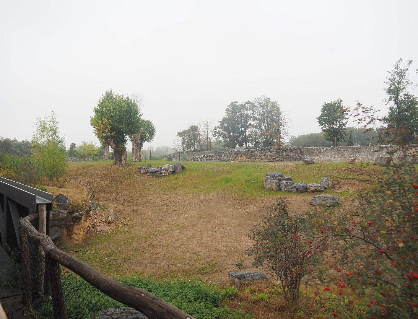 First large Asian elephant paddock seen from the train, 2022-09-14