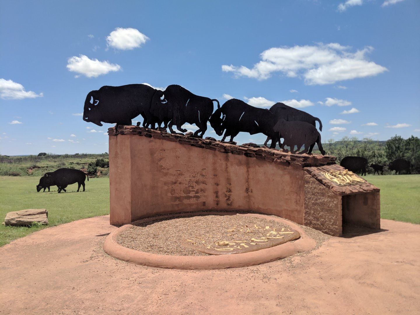 Flattened steel bison sculpture