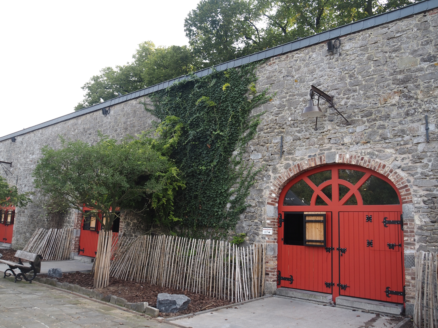 Former main gift shop building, now housing farm animal stables, 2024-09-17