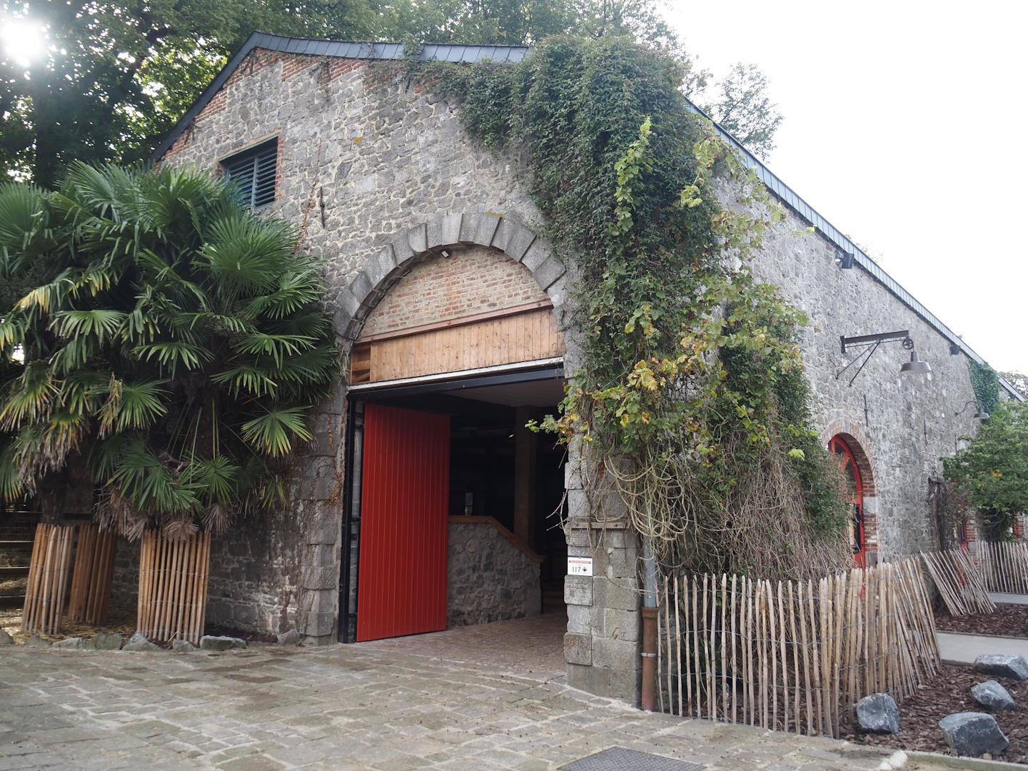 Former main gift shop building, now housing farm animal stables, 2024-09-17