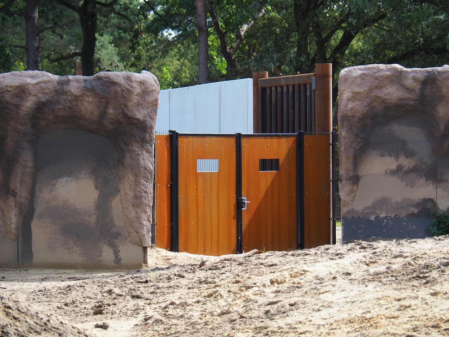 Gates from holding area into new spotted hyena exhibit and African elephant valley, 2023-08-15