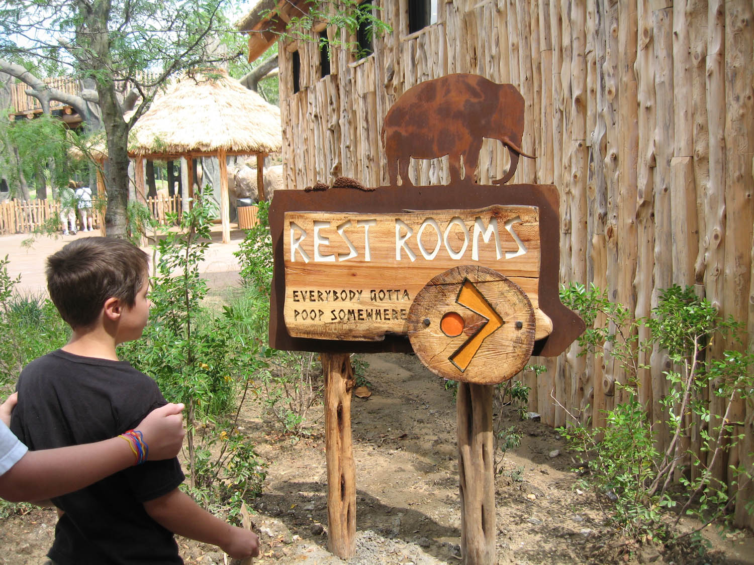 Giants of the Savanna: Restroom sign