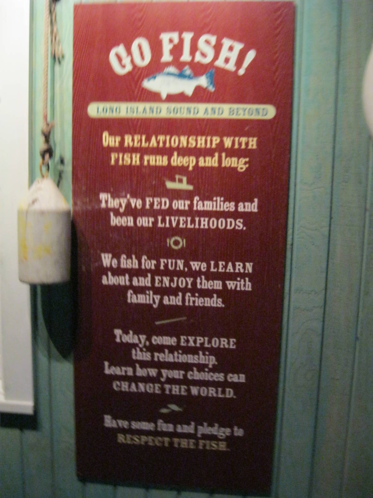 Go Fish!- Fish and Man Signage