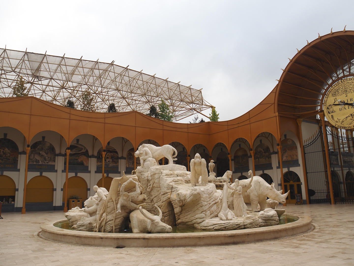 Golden Clock Square entrance area fountain with animal statues and roof construction of The Sanctuary, 2024-09-17