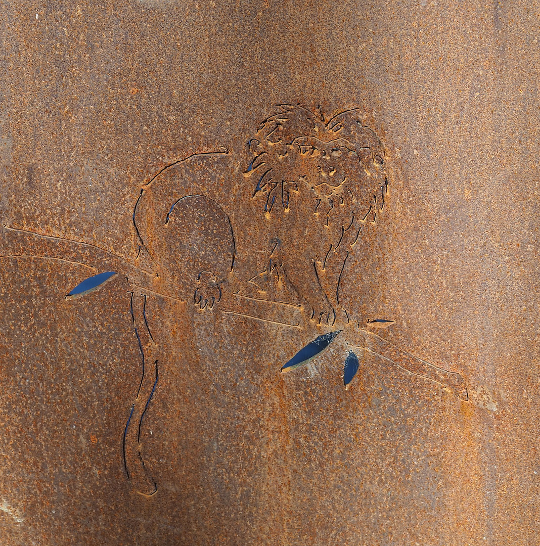 Golden-headed lion tamarin artwork in wall of bridge to South American primate island, 2022-04-12