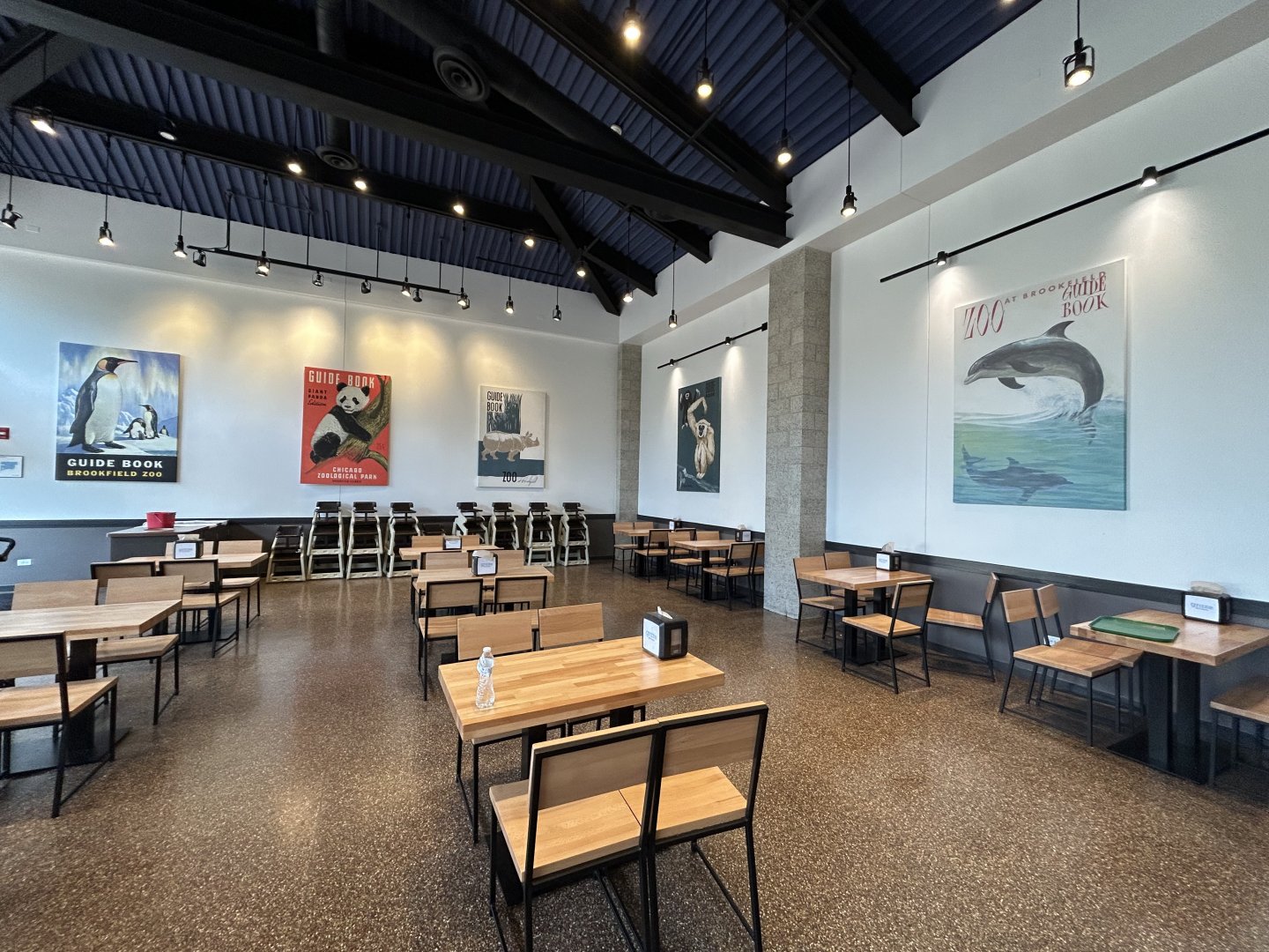 Graze Restaurant Dining Area w/ Guidebook Posters