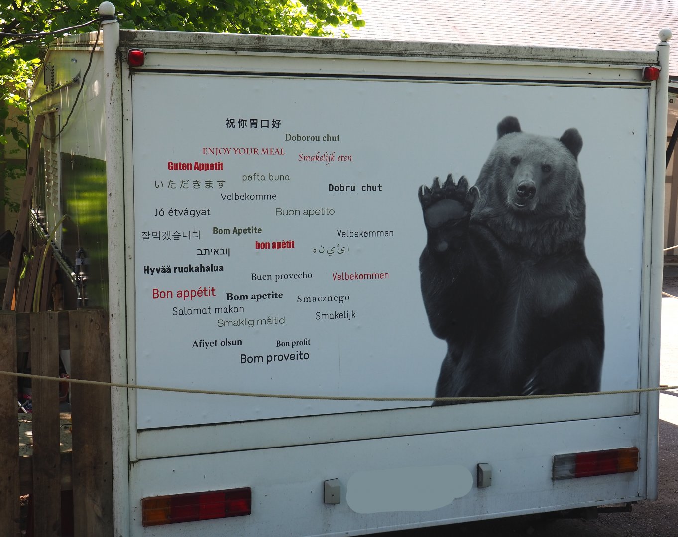 Have a nice meal sign with bear on the sign of the food truck, 2021-05-29