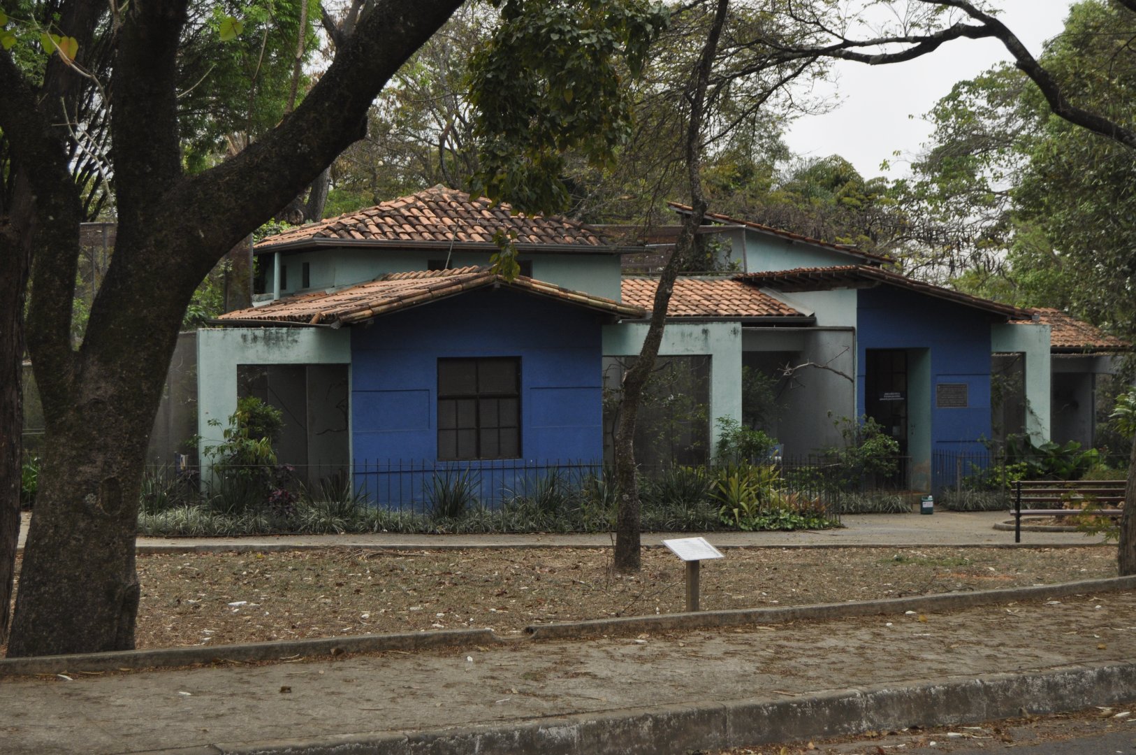 "House of birds", block of small aviairies coupled with a larger non walkable aviary