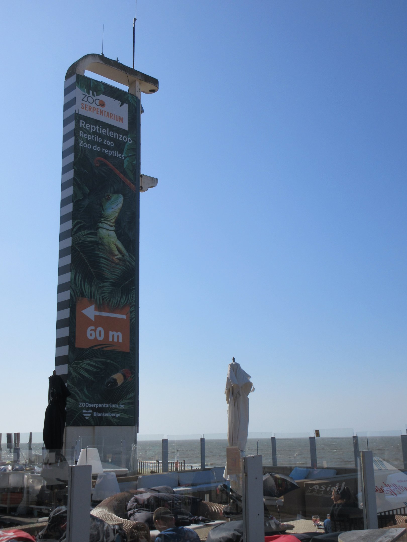 Huge sign on beach boardwalk