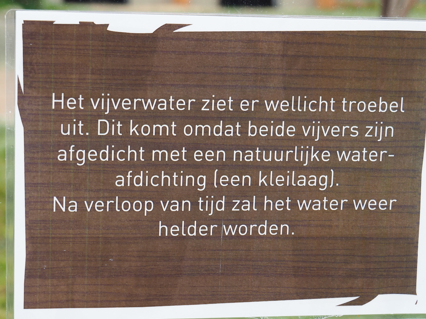 Information sign about the muddy water in the flamingo pool, 2019-07-21