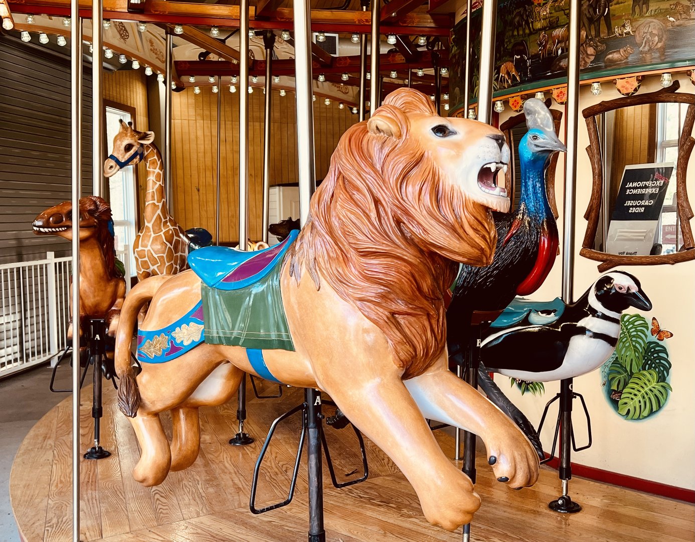 Is there anything at a zoo more haunted by memory than a silent and empty carousel?