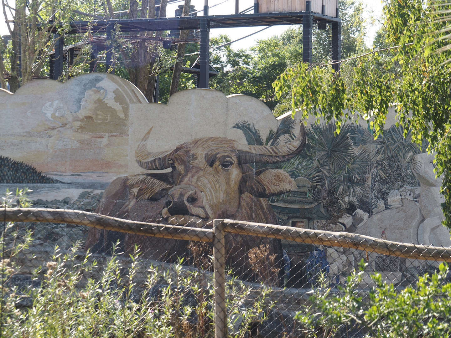 Islands of the Rising Sun - Hokkaido - Picture wall around Japanese macaque exhibit, seen from Australian area, 2024-09-17