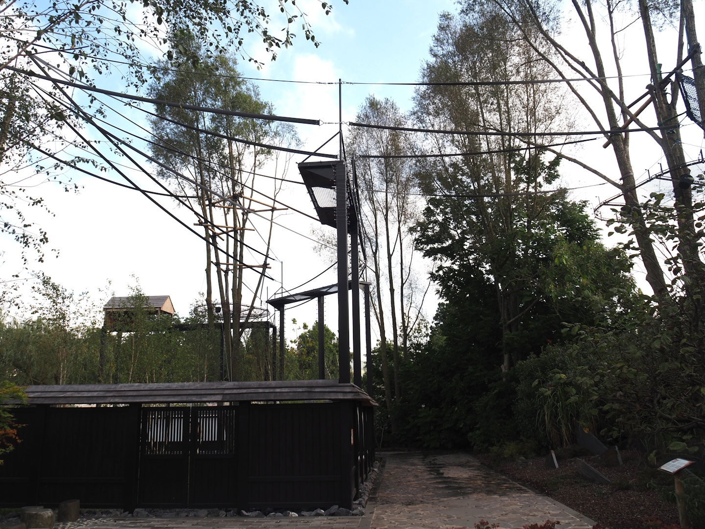 Islands of the Rising Sun - Hokkaido - Walkway, wall of Red-crowned crane exhibit and Siamang structures, 2024-09-17