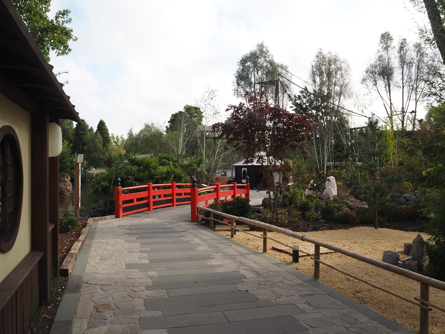 Islands of the Rising Sun - Honshu - Part of Japanese garden and bridge to Hokkaido island with cranes and primates, 2024-09-17