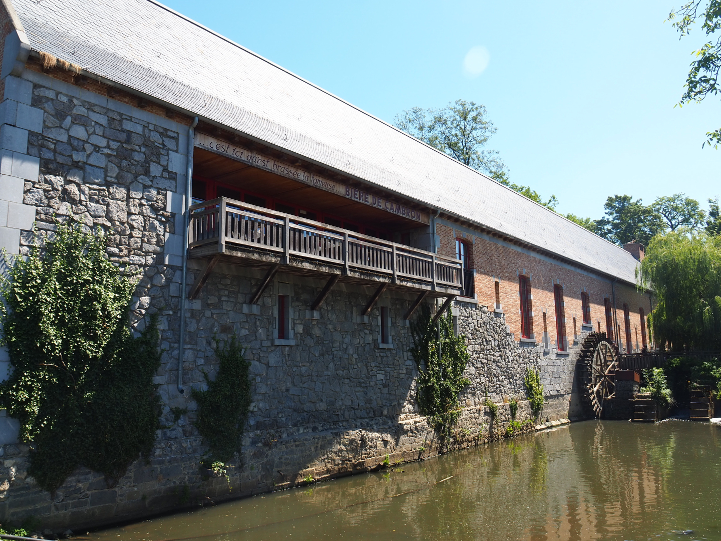 Large watermill building on the bank of the Dender river - Brewery and tavern, 2022-06-28