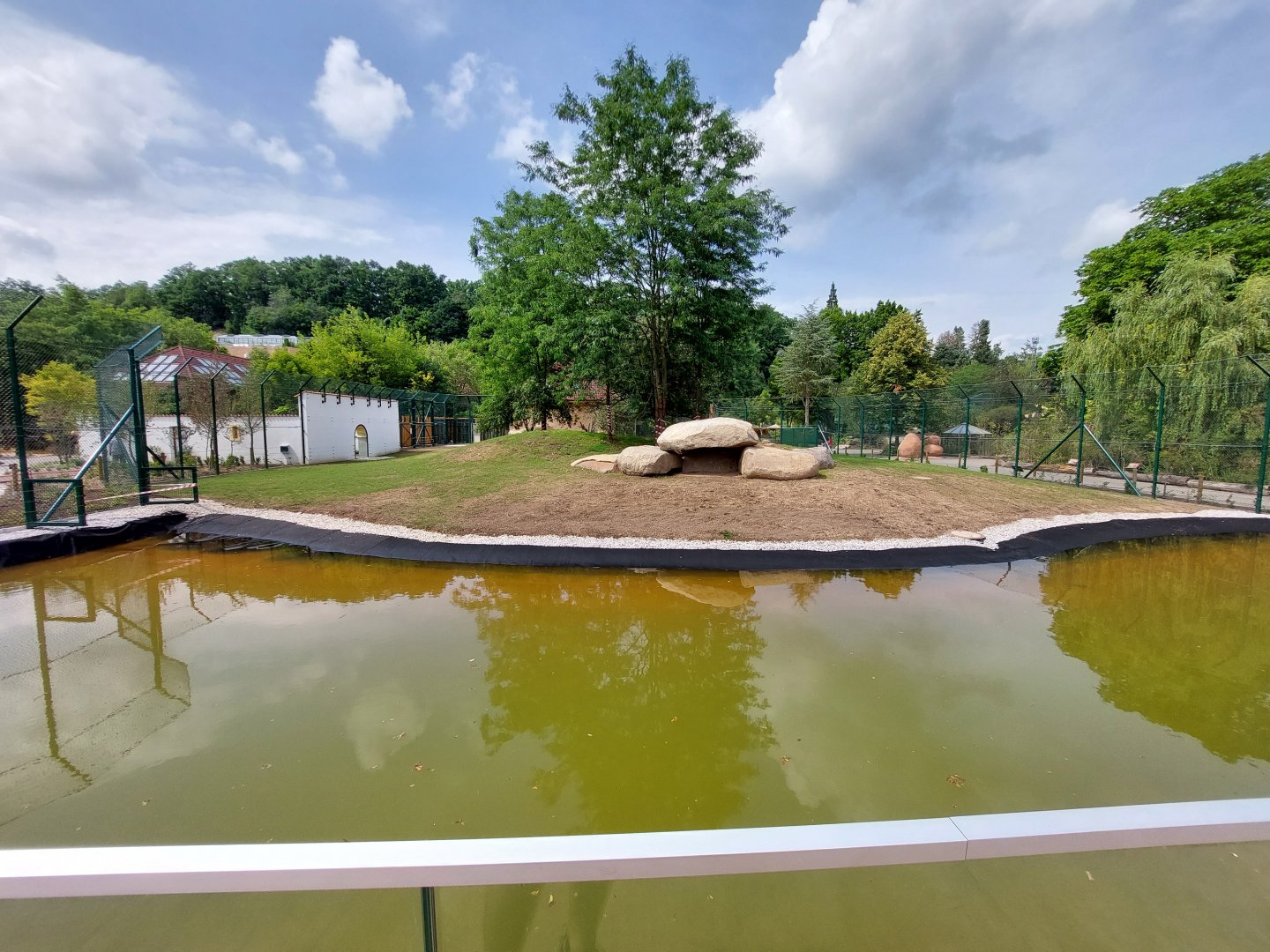 Lion exhibit reconstruction - Water moat view