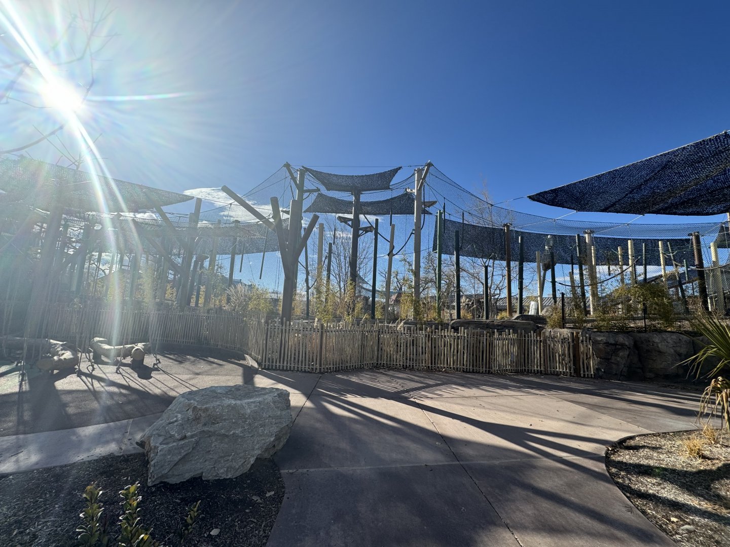 Long rotating exhibit next to children’s ropes area