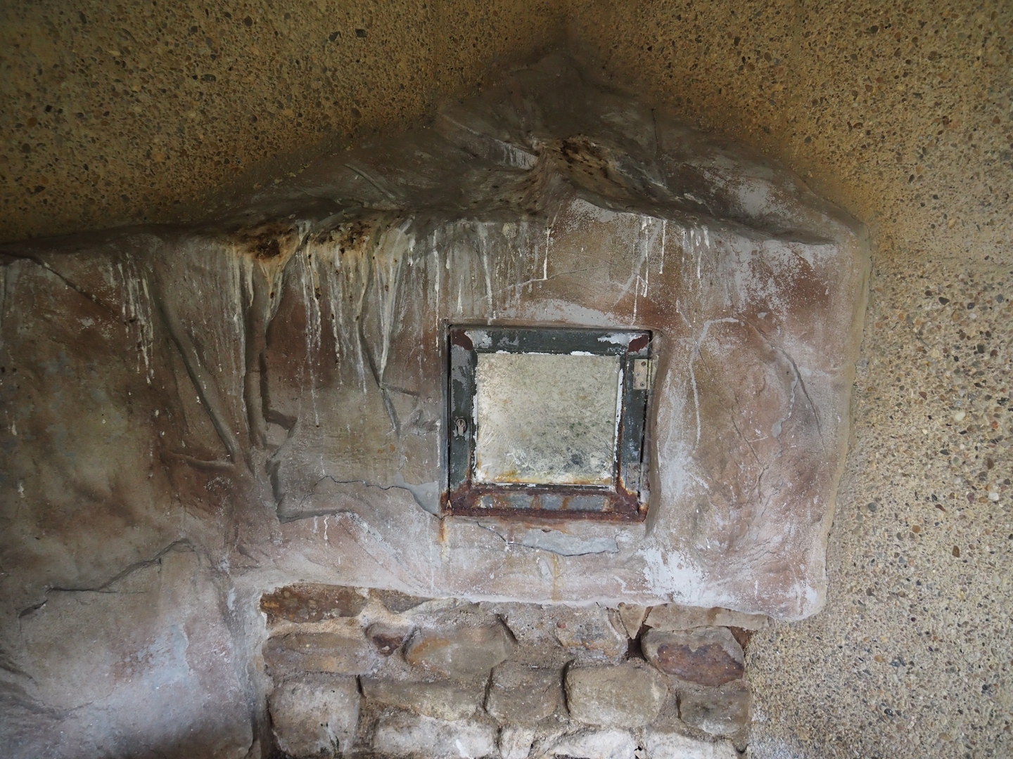 Looks into penguin nesting cavity, but with window covered in poop, 2025-05-22