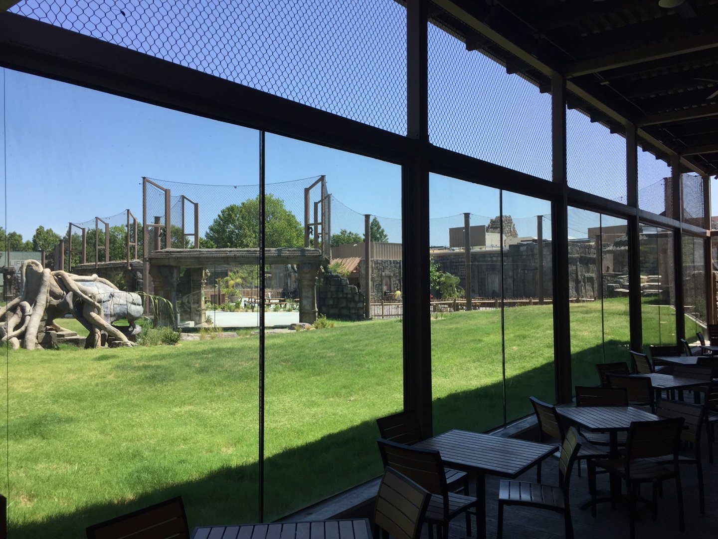Lost Kingdom - dining patio with viewing into tiger yard