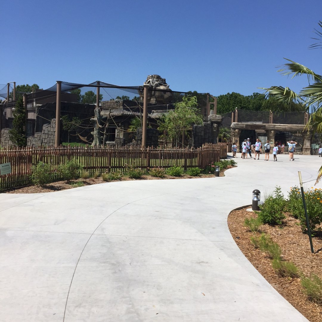 Lost Kingdom - Entrance path.  Siamang habitat on right, Komodo dragon habitat on left with indoor exhibits building between.