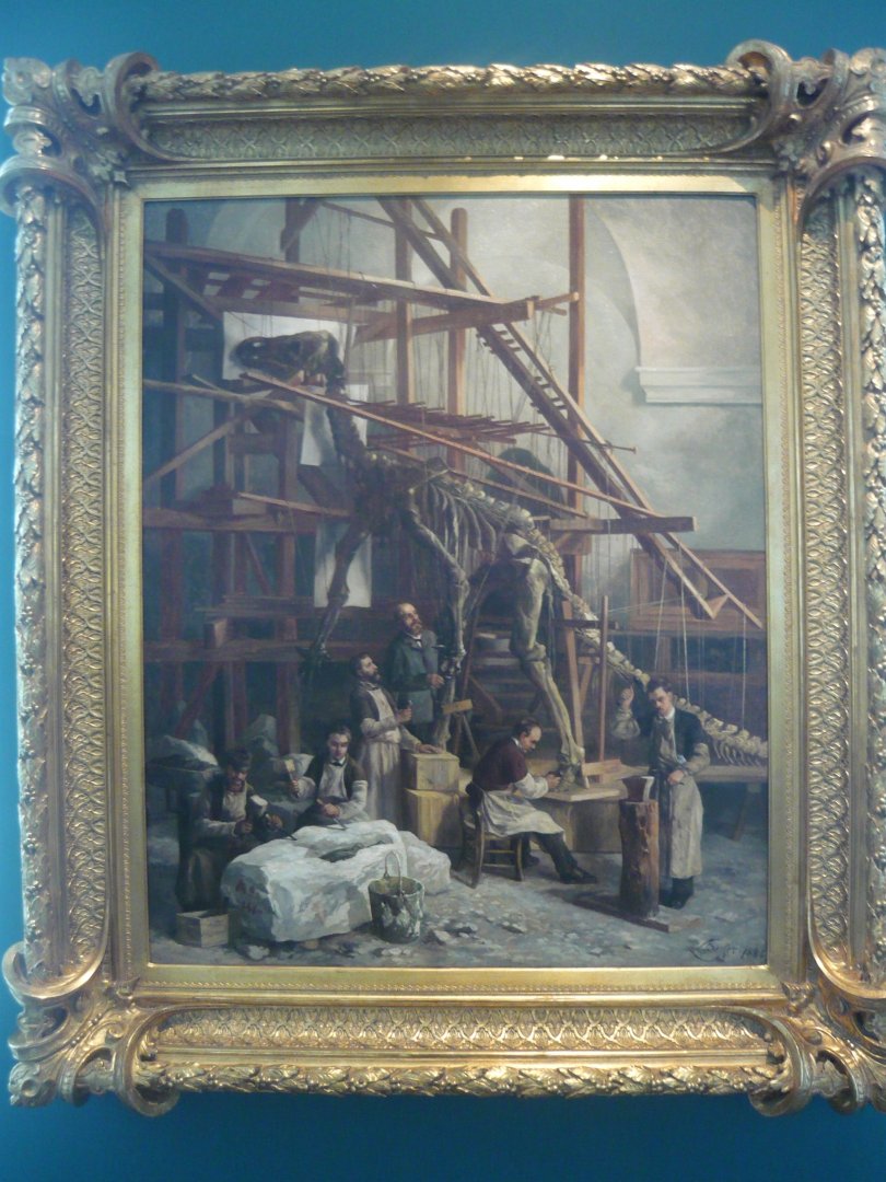 Louis Dollo supervising the mounting of an Iguanodon skeleton