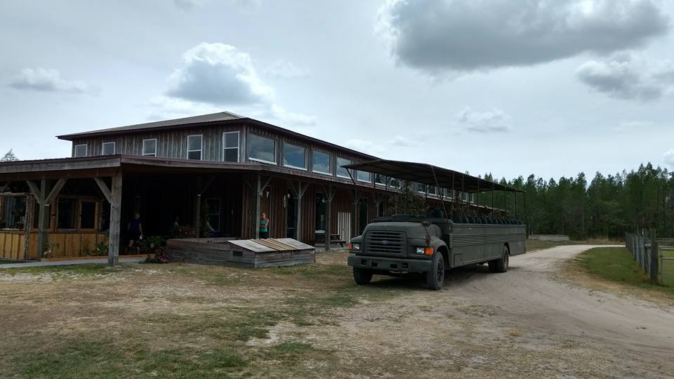 Main building and truck/jeep used on tours.