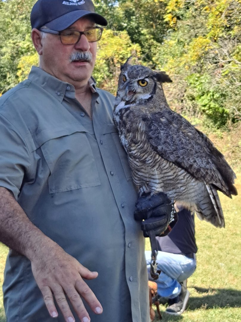 Man with Great Horned Owl (Lake Erie Metropark HawkFest, Wayne County, MI, 9/21/24)