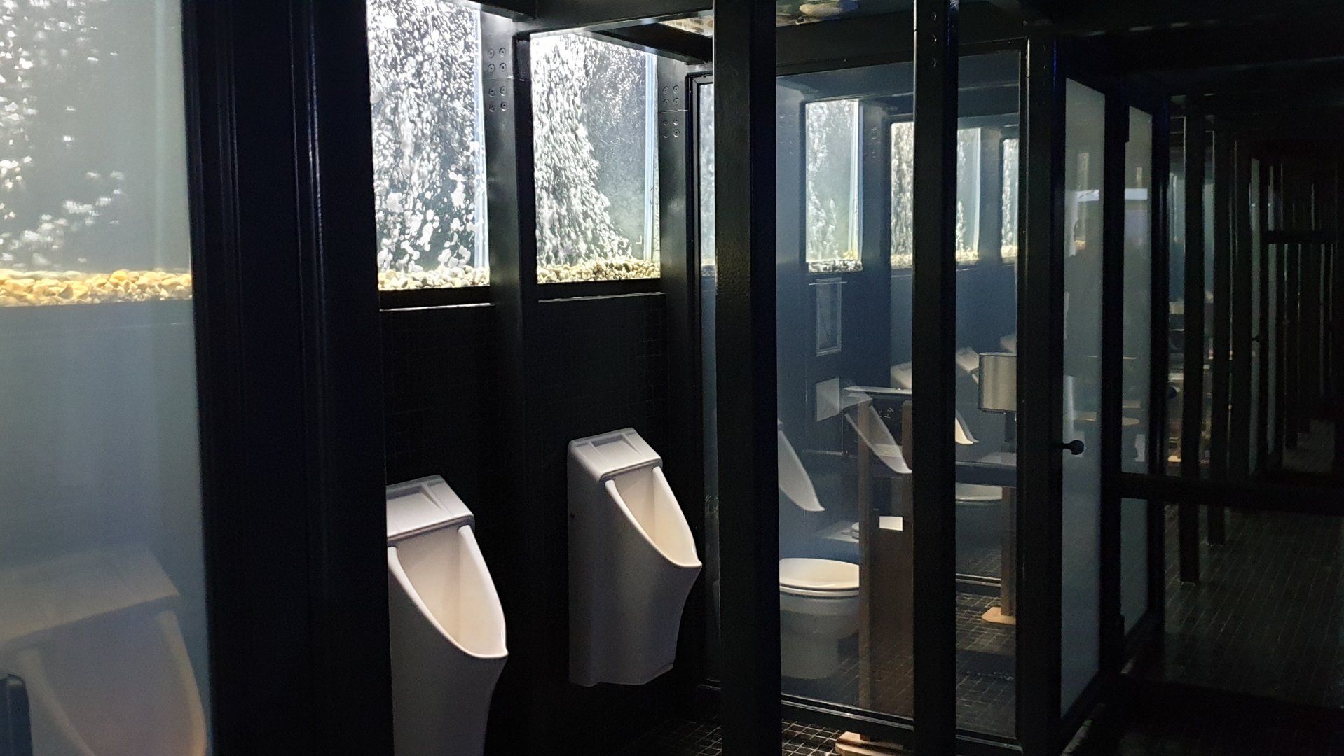 Mens toilet next to the Aquarium