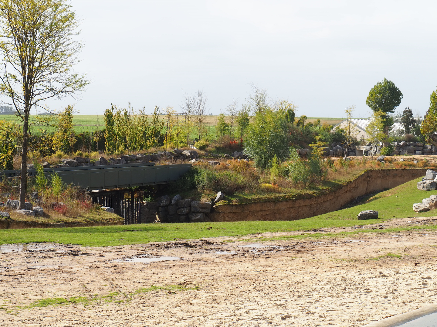 Mostly hidden elephant barn and elephant access to holding, 2019-10-04