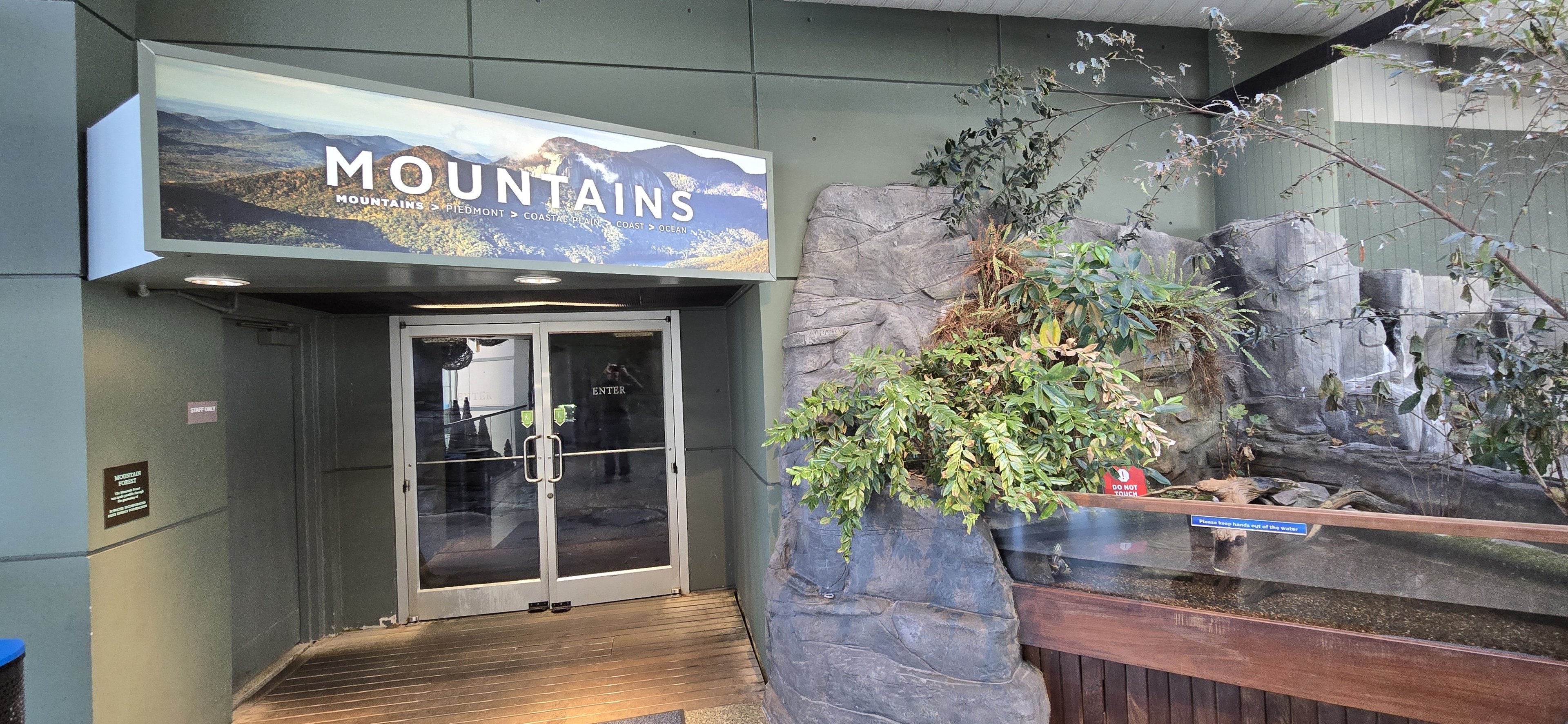 Mountains -  Entry sign and doors