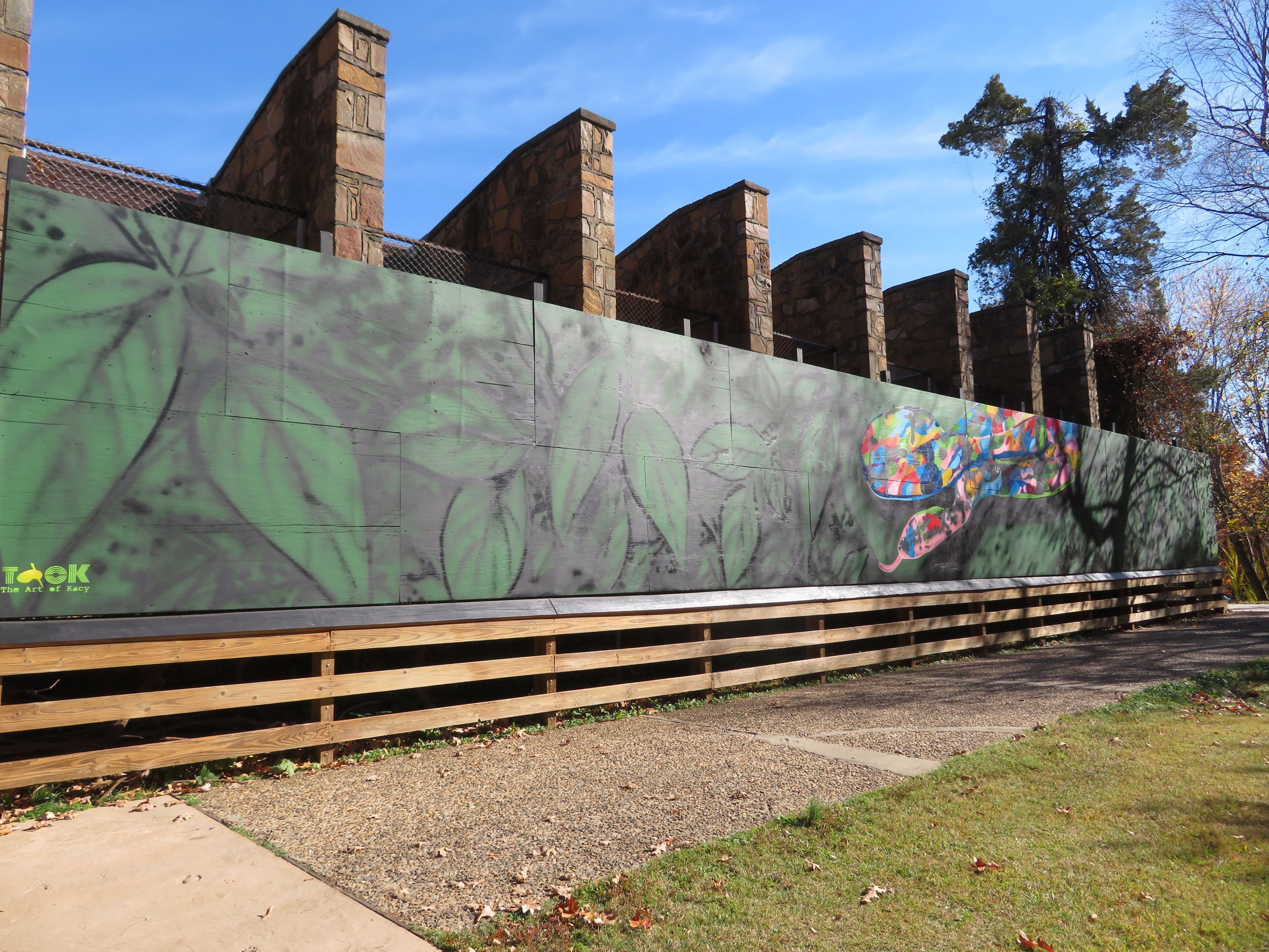 Mural Billboard Blocking Old Primate Enclosures