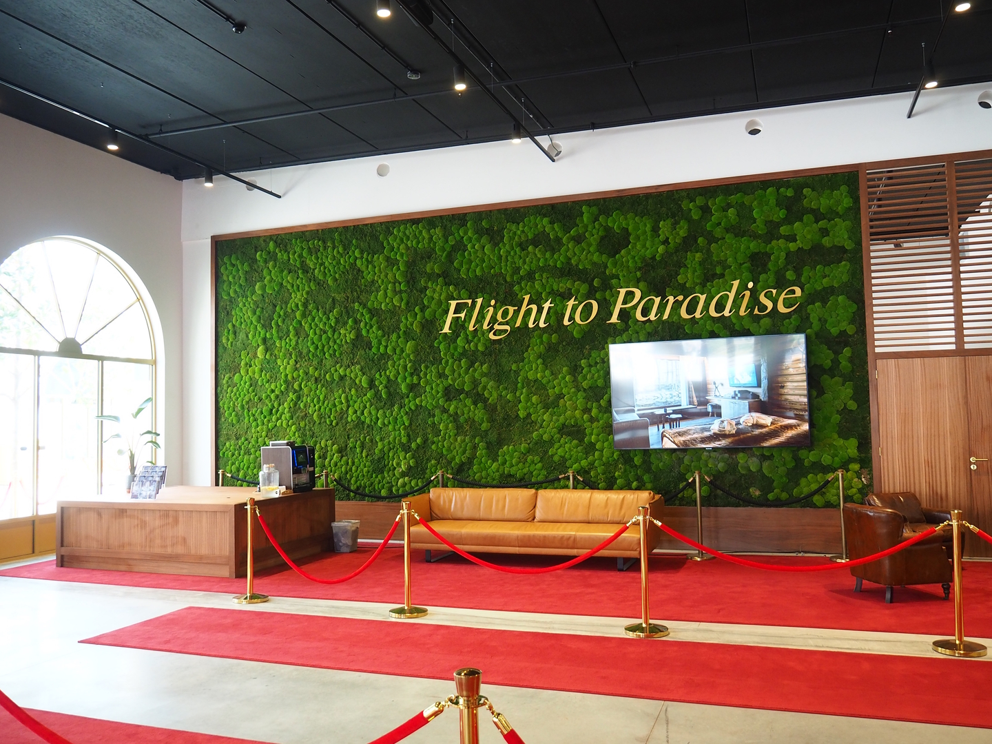 New entrance - Moss wall and promotion screen in the resort reception lobby, 2023-05-16