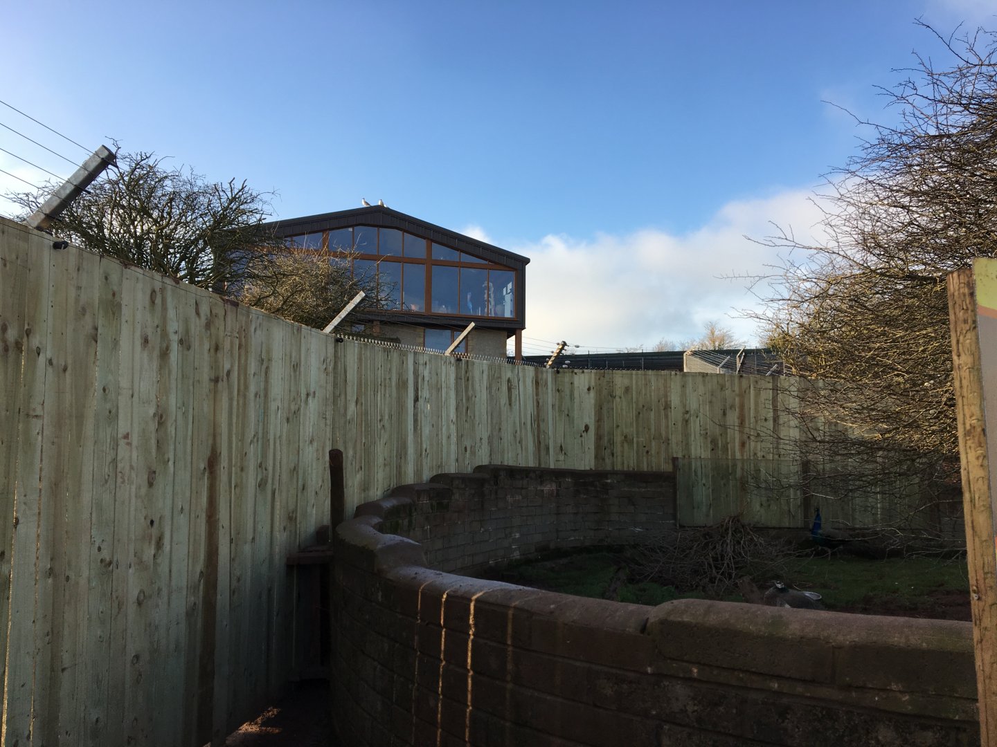 New fence separates zoo from owners house
