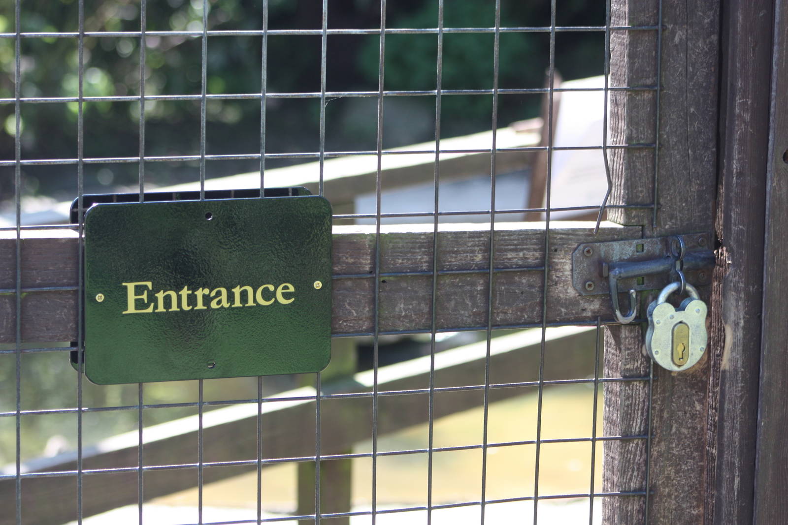 New signage on the walk-through aviary entrance (not surprisingly!) door, 9