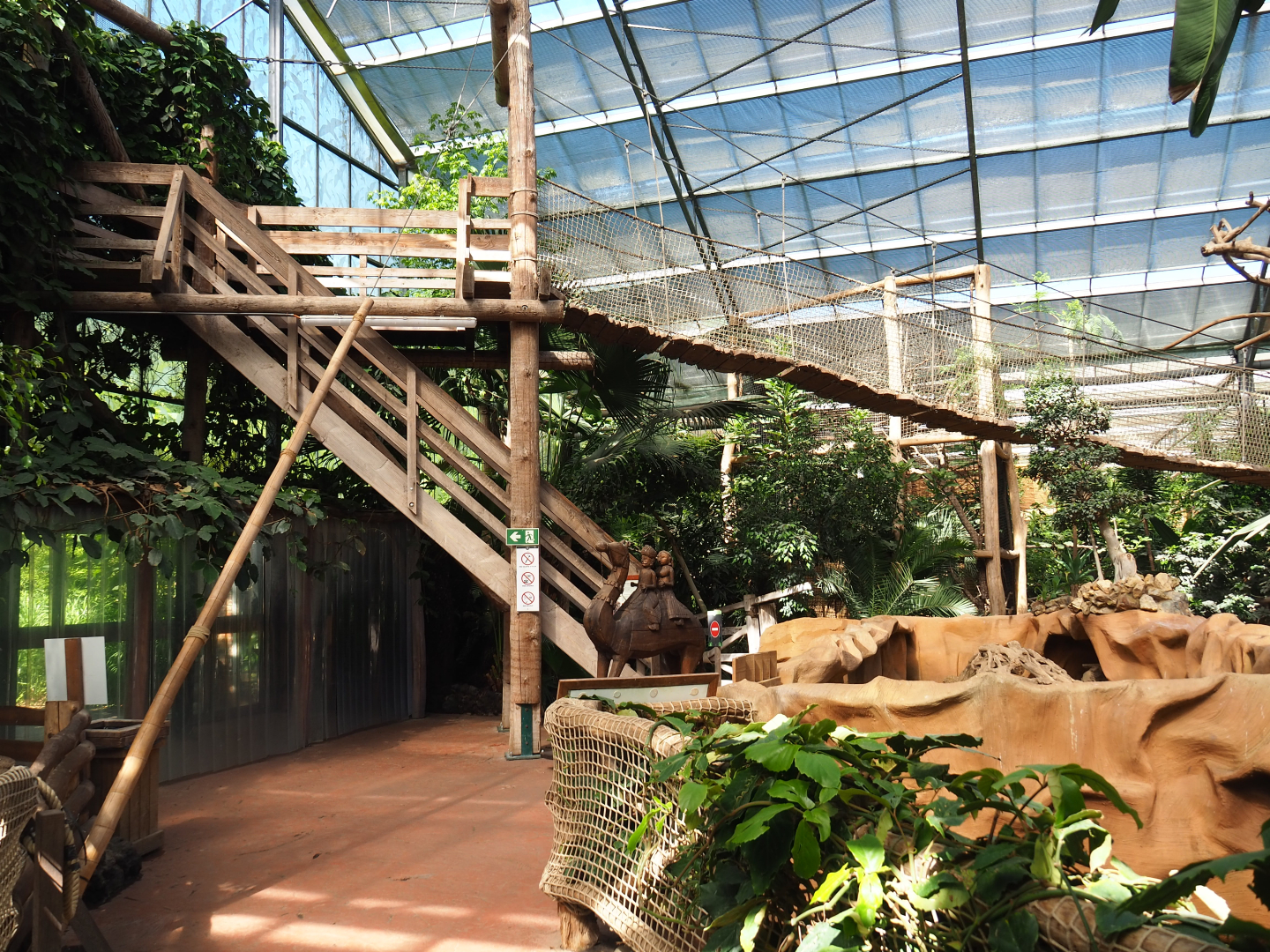 Oasis - View with one of the entrances, access to adventure bridge and Large hairy armadillo exhibit, 2022-06-28