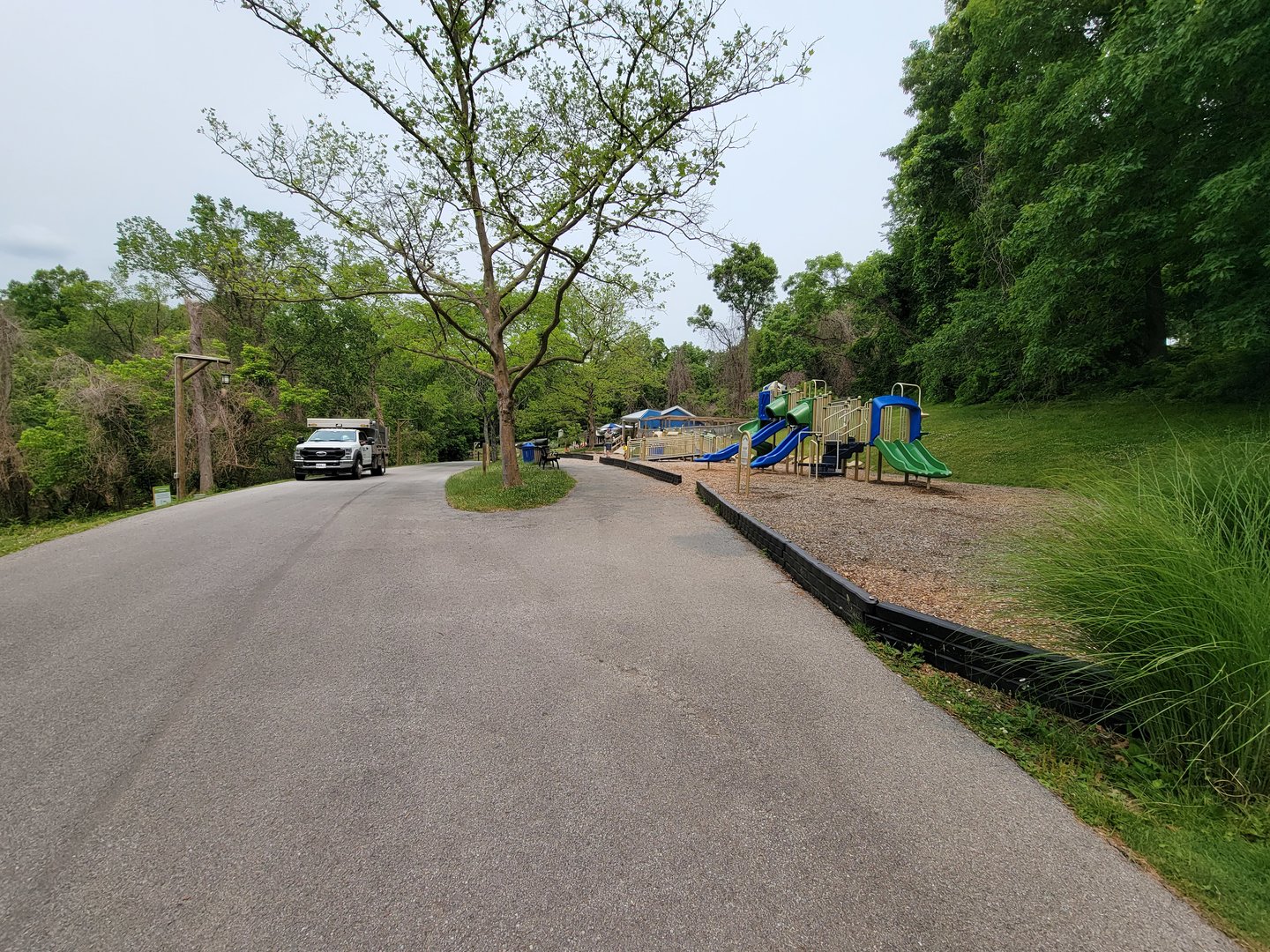 Oglebay Good Zoo - Path past cheetahs, playground