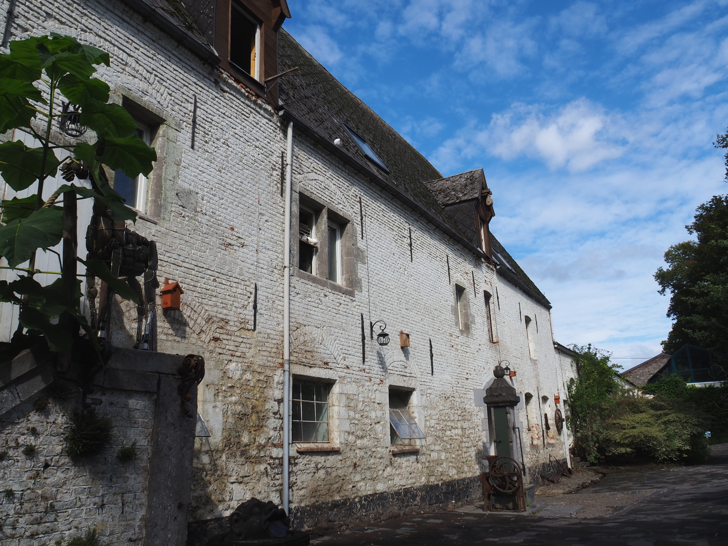 Old building with stables for farm area and visitor passage, 2022-09-15