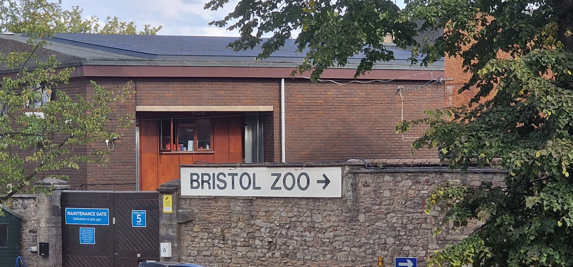 Old sign at car park