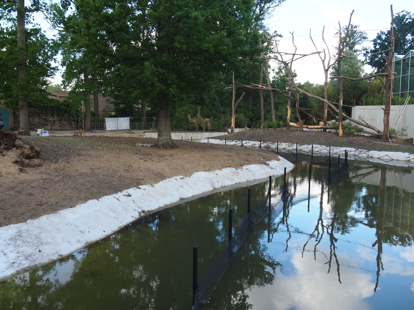 Orangutan project construction, Moat between islands with fence and fifth island, 2022-05-28