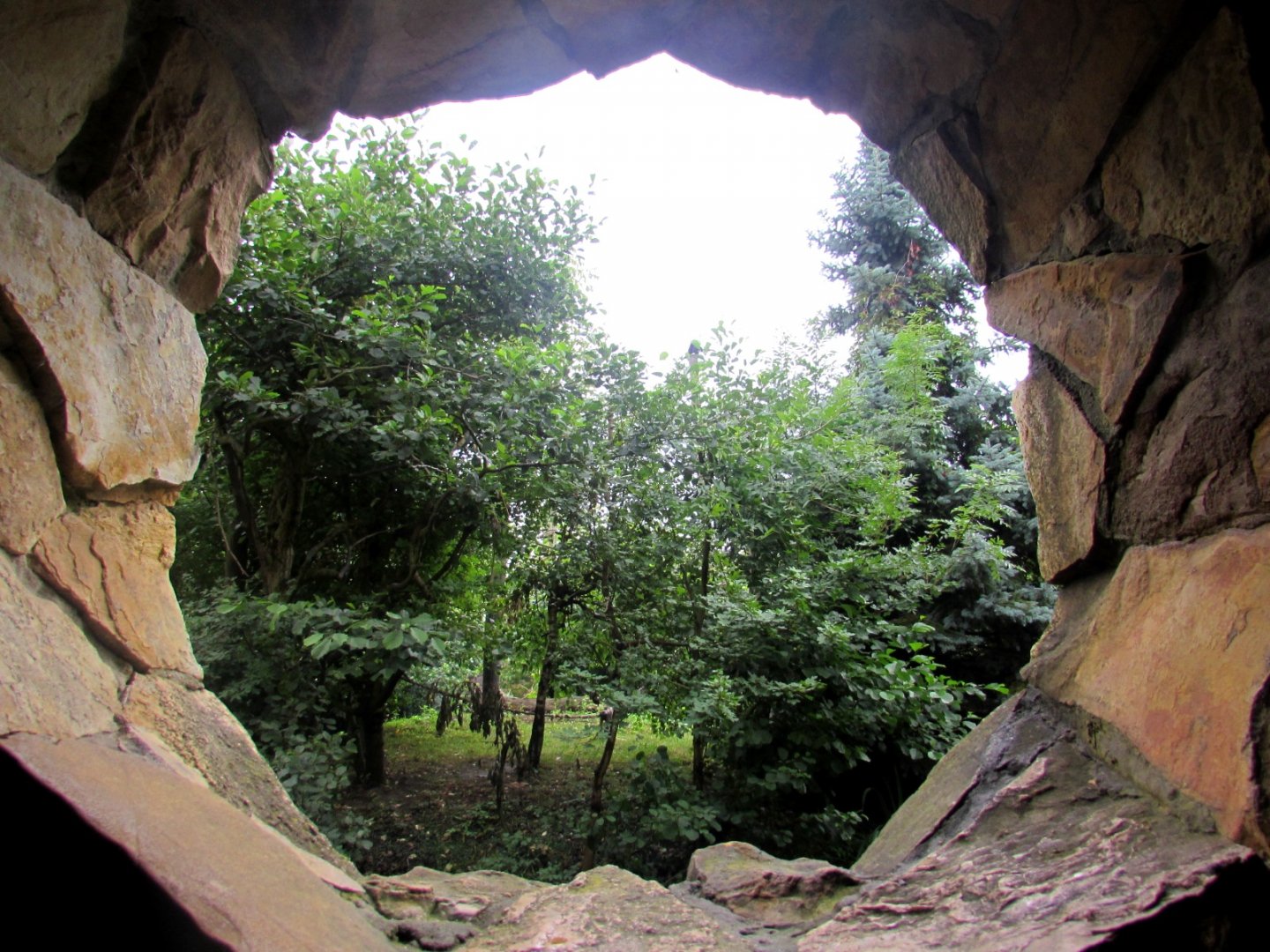 Oval observation window in the pavilion. View of the Gibbon island.