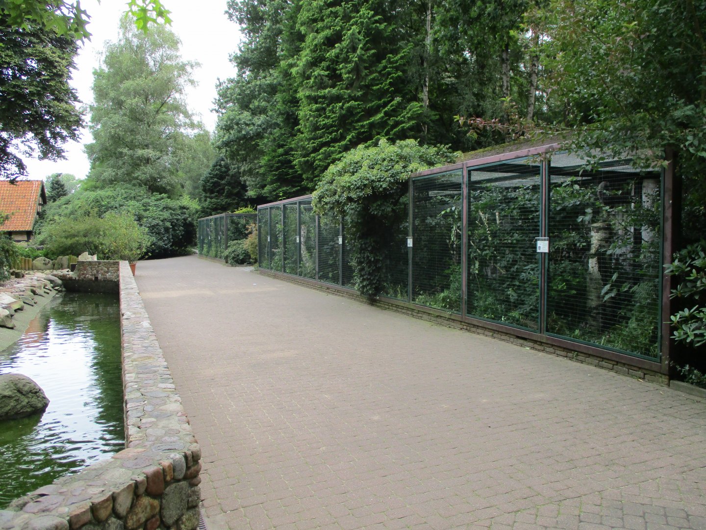 Owl aviaries next to the penguin enclosure