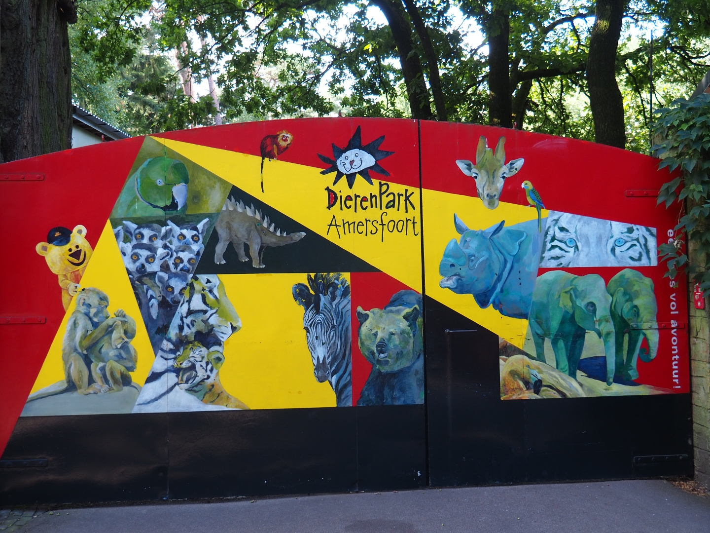 Paintings on gate to behind-the-scenes area