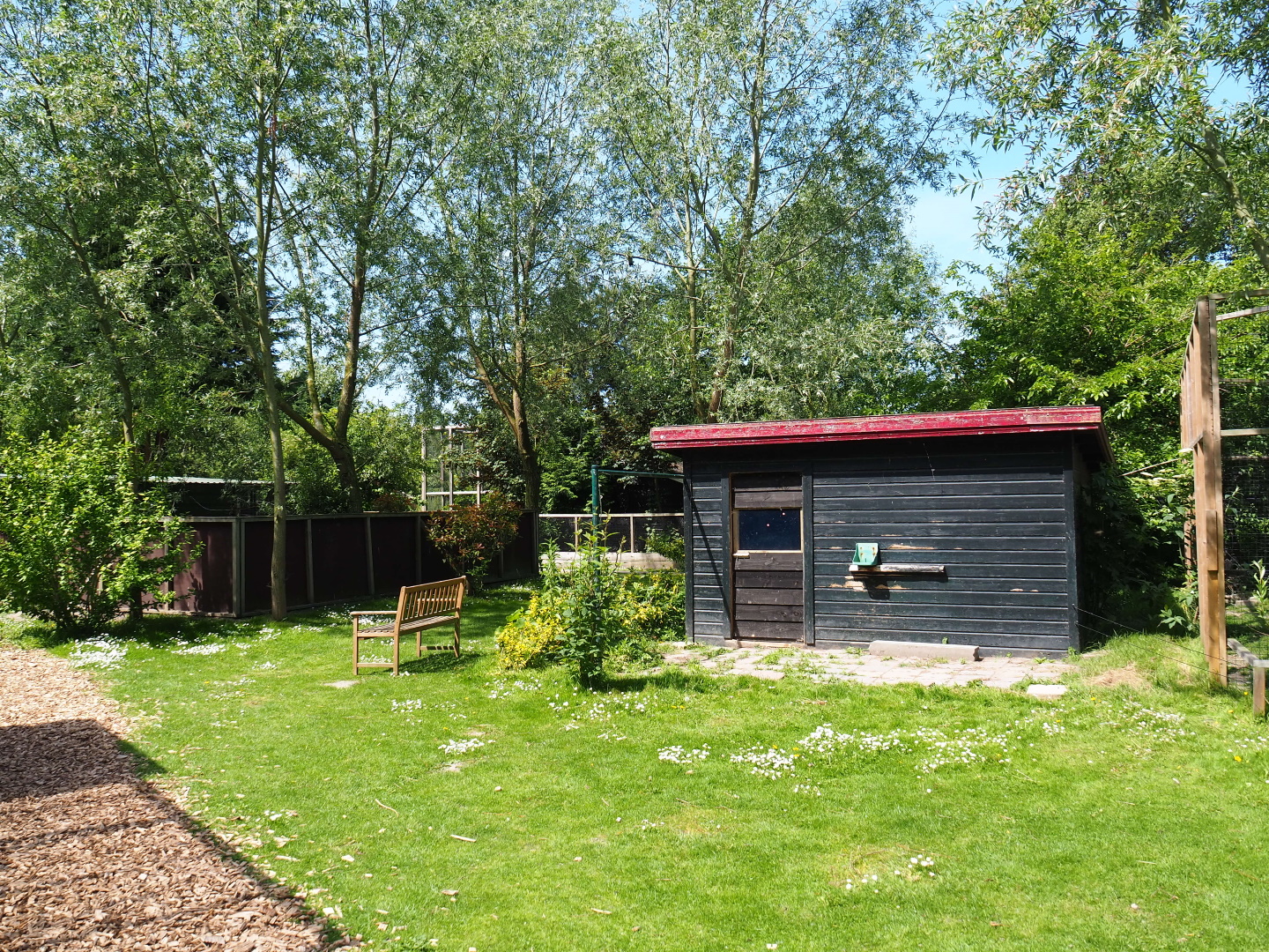 Park view with former animal barn, 2019-06-01