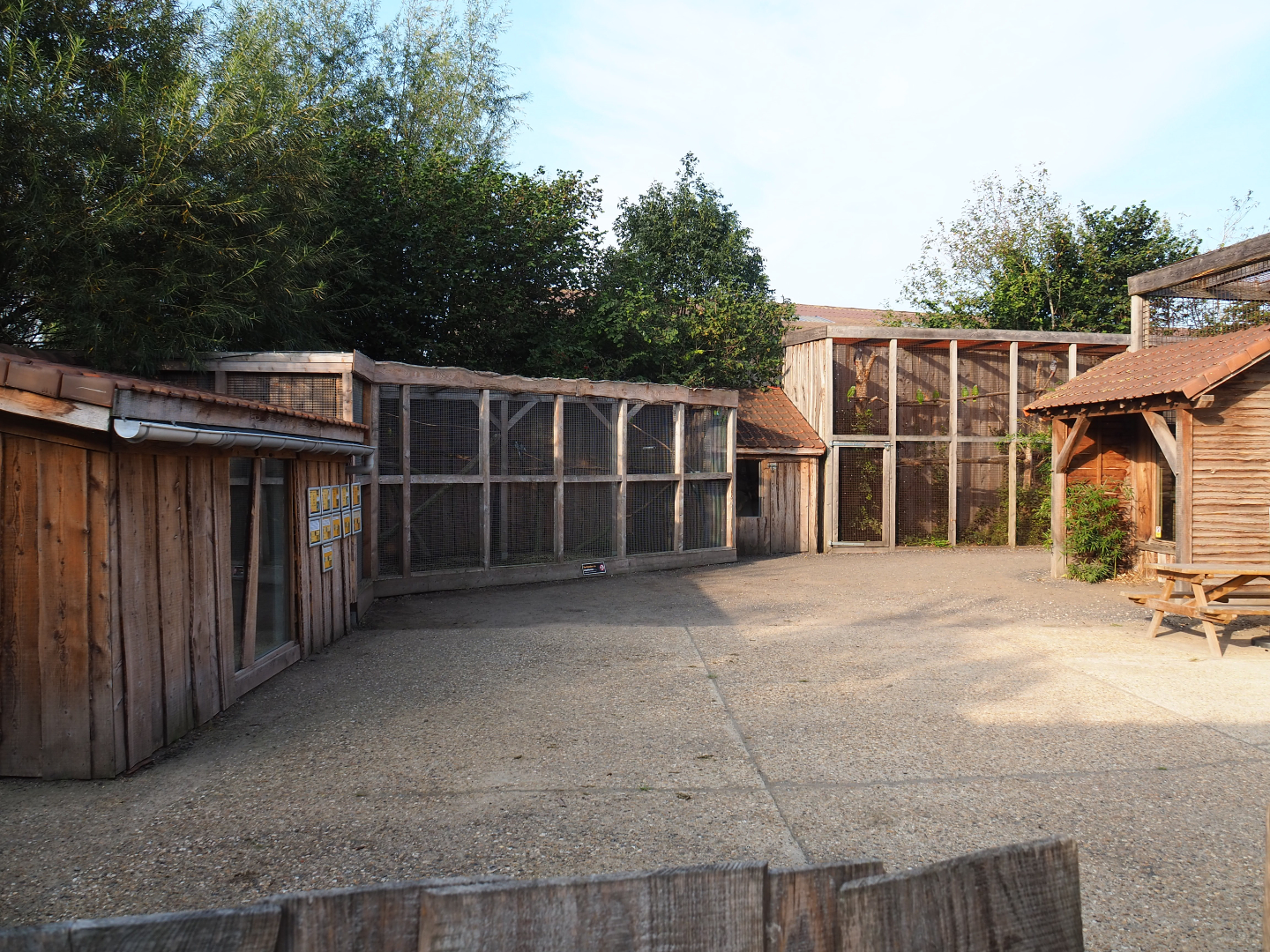 Park view with parrot aviaries and lion-tailed macaque viewing area, 2020-09-12