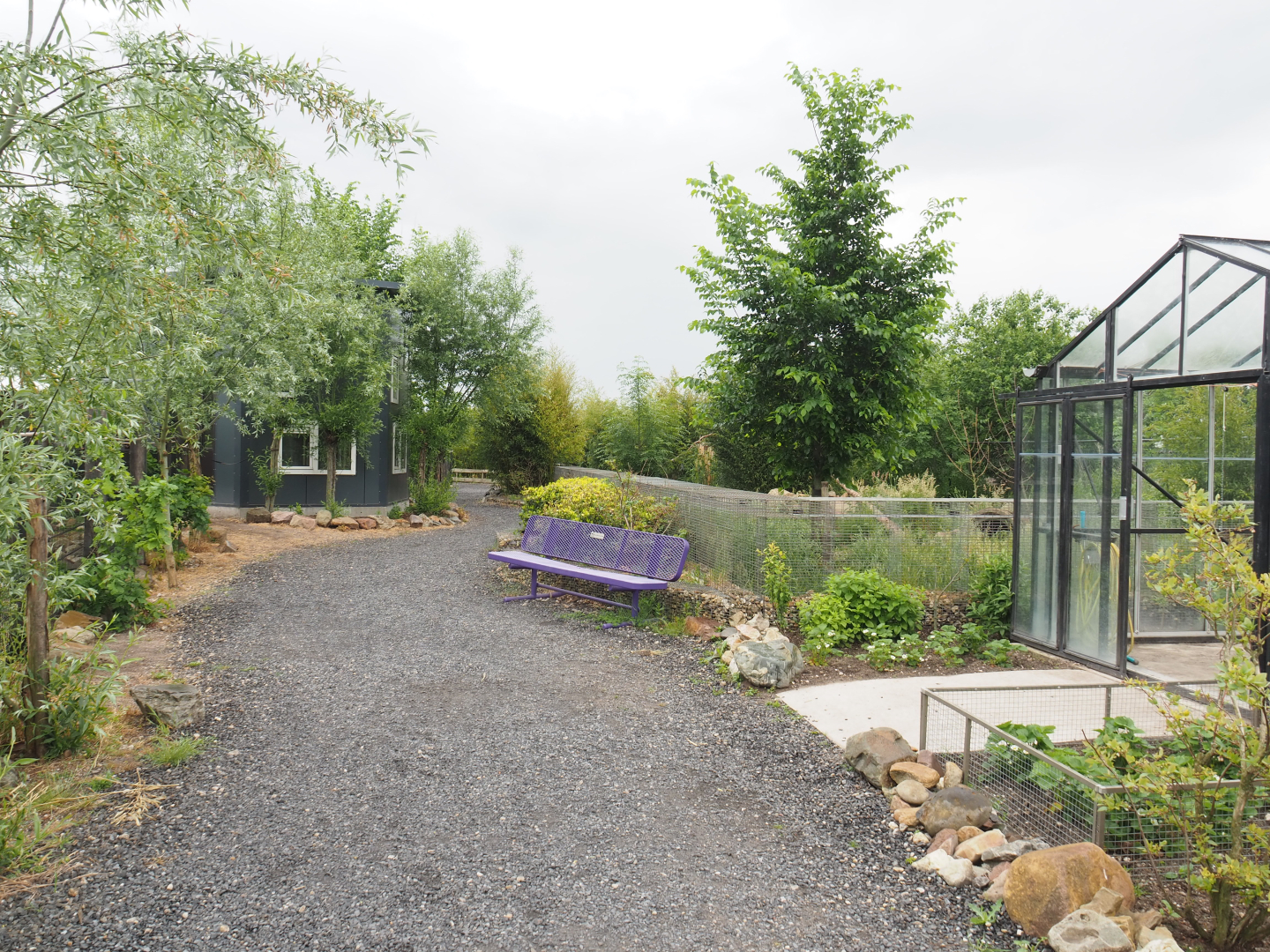 Park view with vegetable garden, future spider monkey house and bush dog exhibit, 2022-05-17